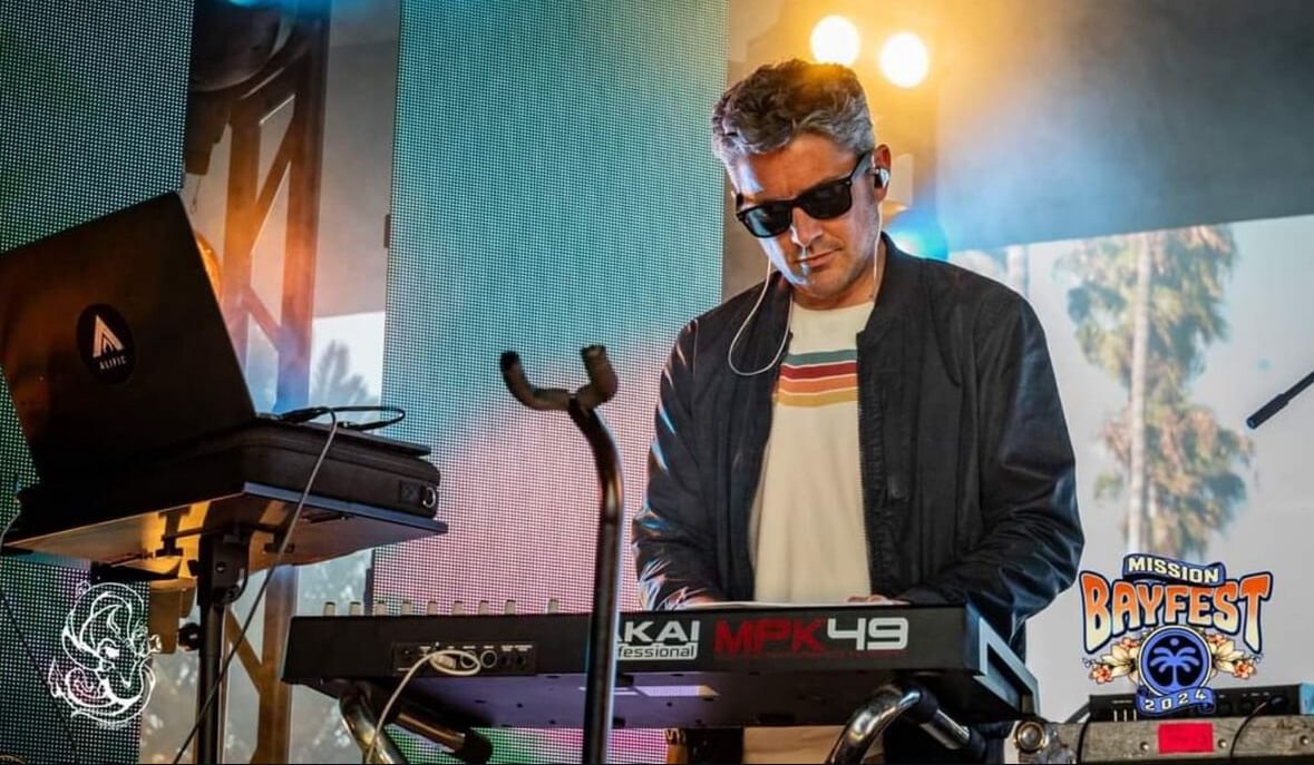 Alific performing a DJ set at Mission Bayfest