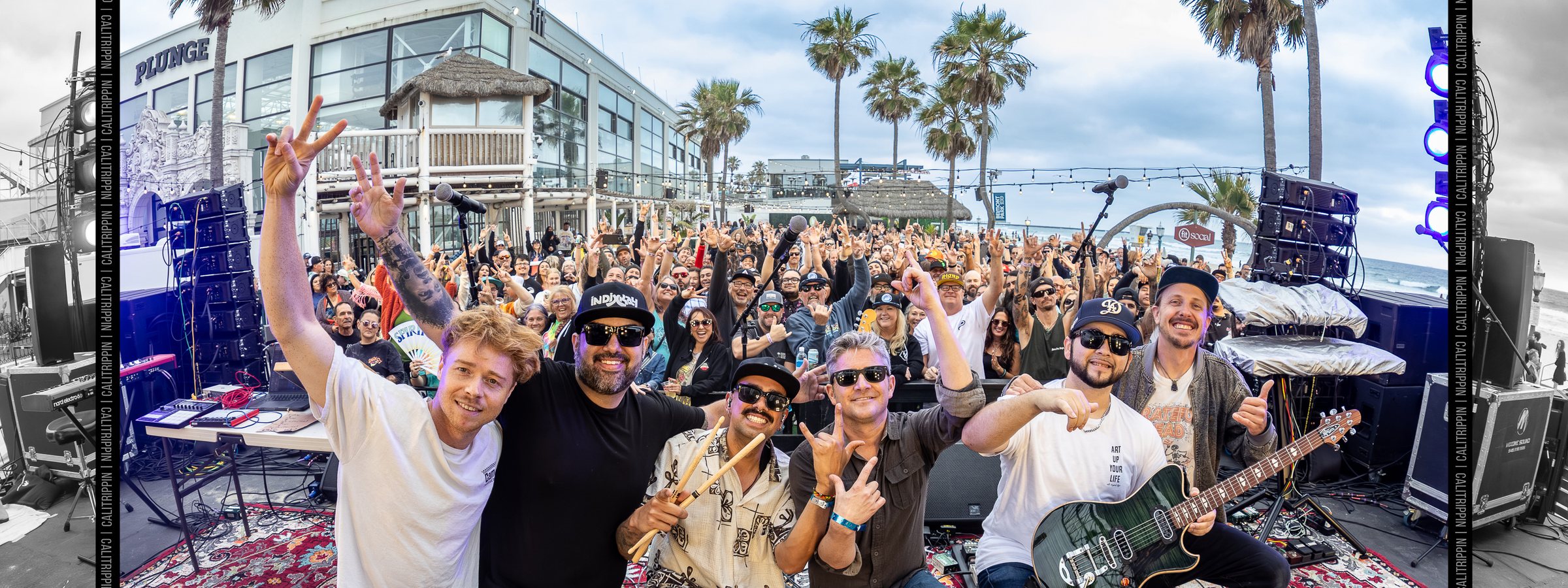 Alific and the live band playing to a full outdoor crowd